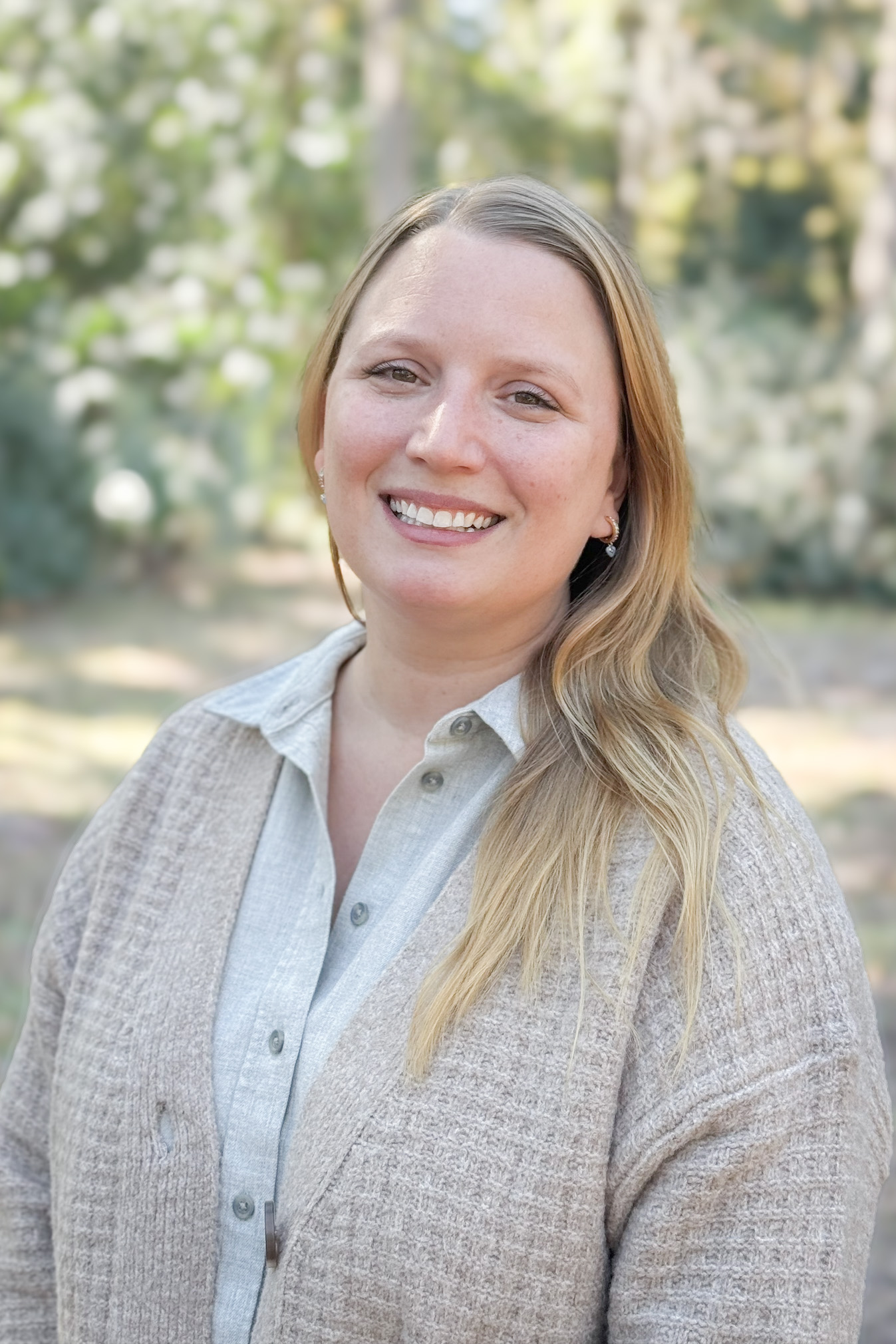 headshot of Elizabeth “Izzy” McAlister, EI